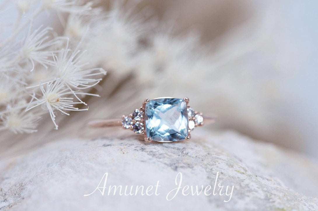 Engagement ring with blue aquamarine cushion, , cushion cluster aquamarine ring