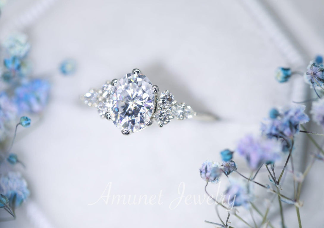 Engagement ring with Charles & Colvard oval moissanite paired with diamonds - Amunet Jewelry