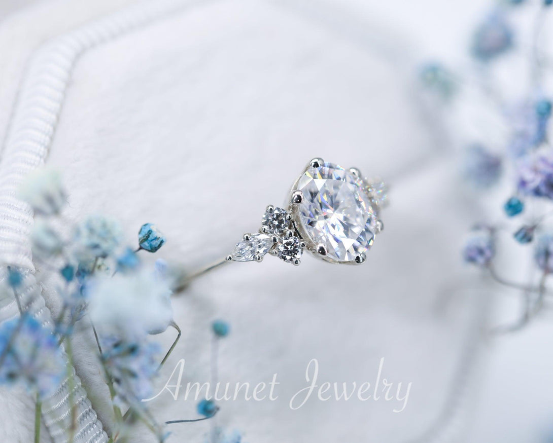 Engagement ring with Charles & Colvard oval moissanite paired with diamonds - Amunet Jewelry