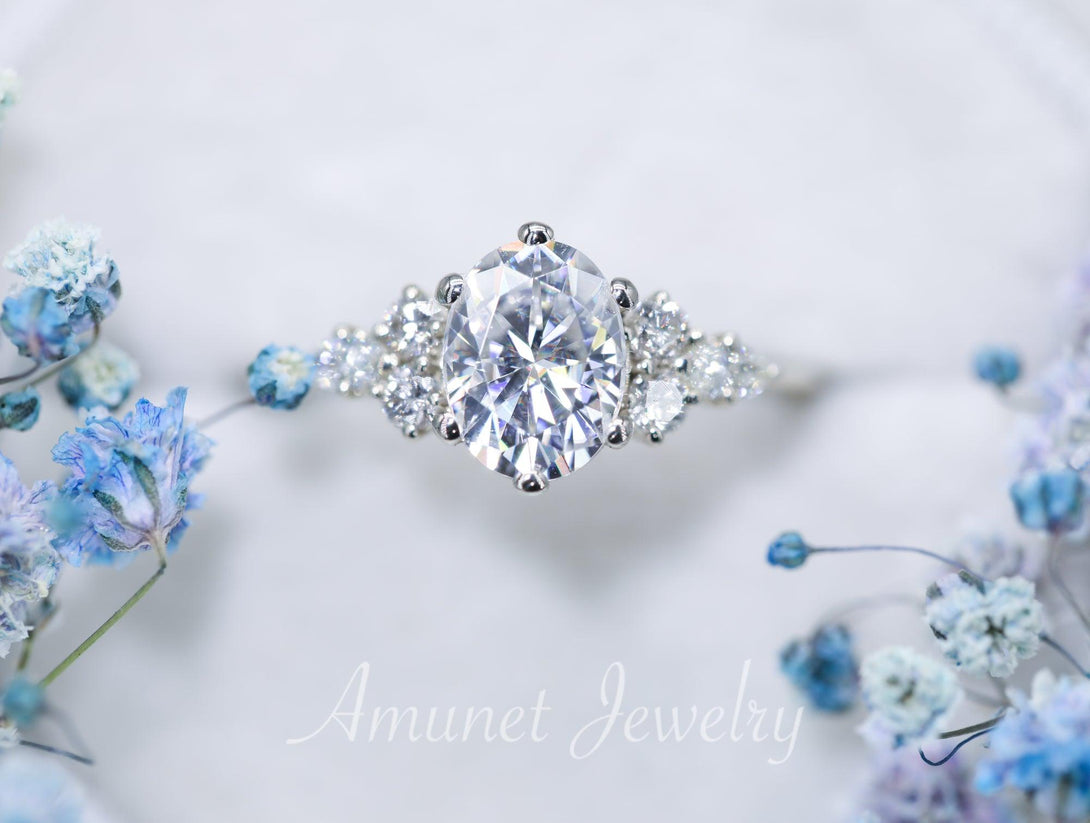 Engagement ring with Charles & Colvard oval moissanite paired with diamonds - Amunet Jewelry