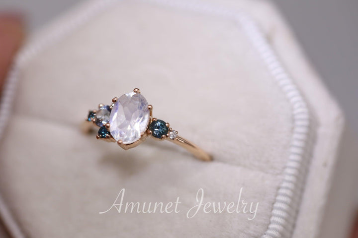 Oval moonstone engagement ring, montana sapphire, blue and white diamonds, cluster ring, unique engagement ring - Amunet Jewelry